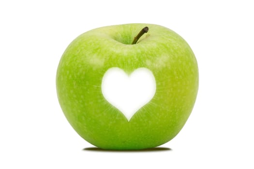 apple with a bright heart shape , over a white background