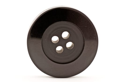 black clothes button ,isolated on white background