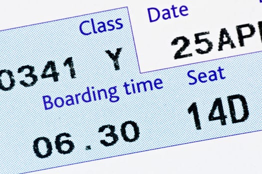 close-up of boarding pass,with time and seat