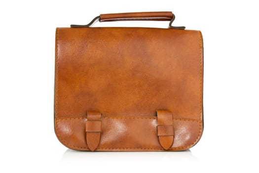 brown leather bag with reflection on white background