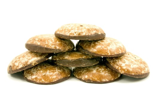 pile of honeyed cookies on white background