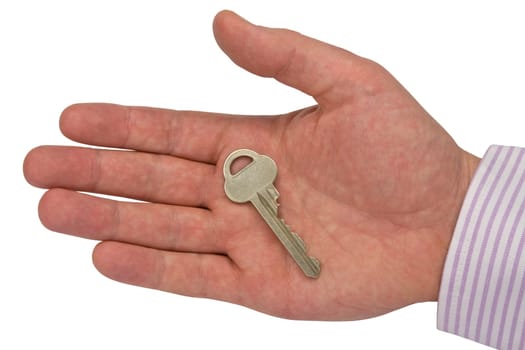 metal key in hand .isolated on white background