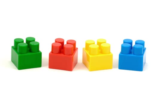 colorful plastic toy bricks ,isolated on white background