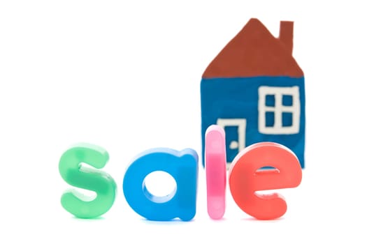 real estate concept. house for sale isolated on white.