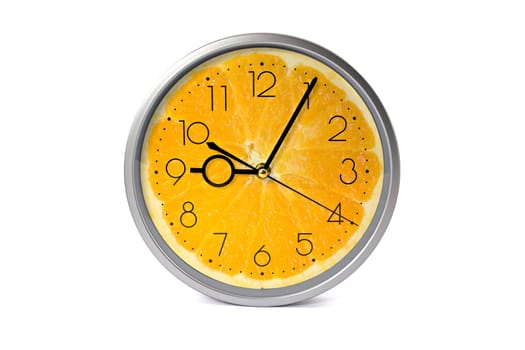 orange fruit clock isolated on white background