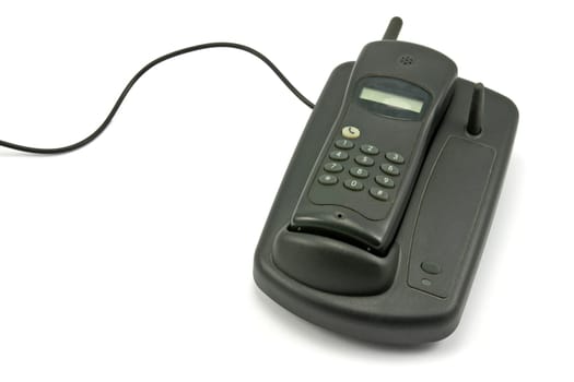 old cordless phone over a white background
