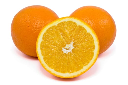 fresh orange fruits over a white background