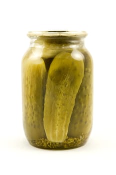 clear glass jar with cucumbers on a white background