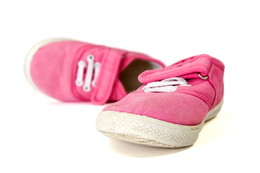pair of baby shoes over a white background