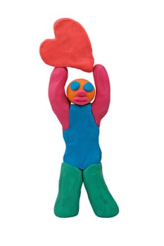 plasticine man hold heart. isolated on white
