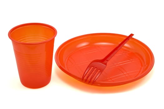red disposable tableware isolated on white background