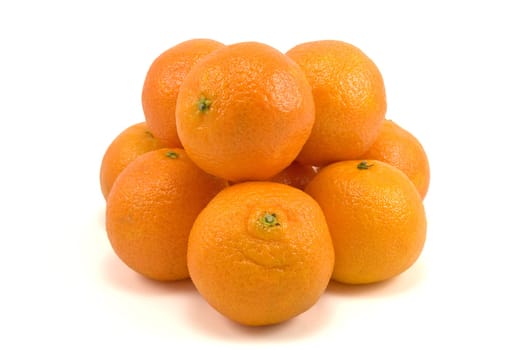 pile of fresh tangerines on white background