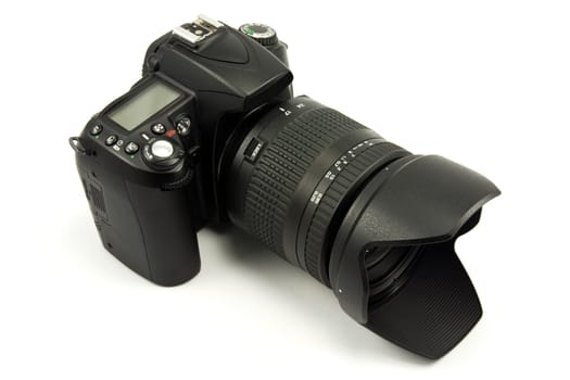 top view of digital photocamera on white background