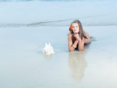 Beautiful woman in bikini on the beach