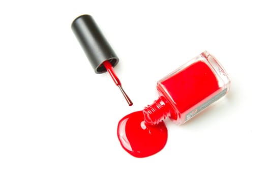 close up of nail polish flow on white background with clipping path