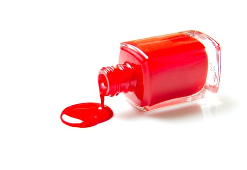 close up of nail polish flow on white background with clipping path