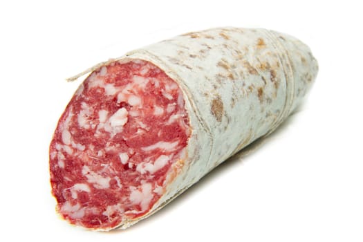 Salami sliced on the white