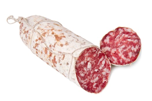Salami sliced on the white