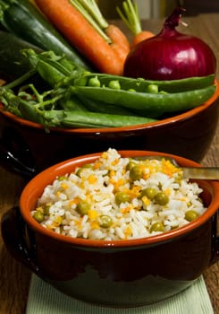risotto with peas in crock