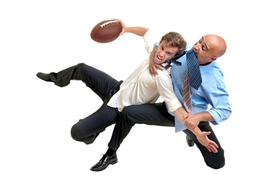 Businessmen playing rugby isolated in white