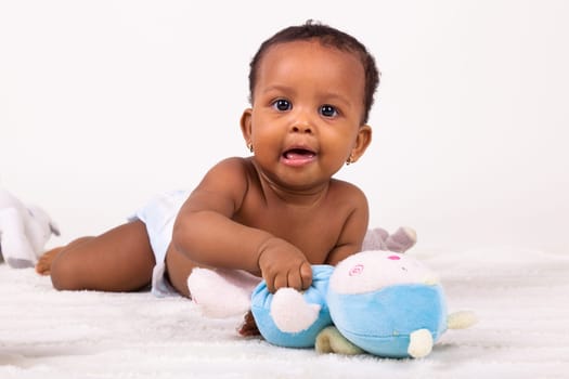 Adorable little african american baby girl  lying down