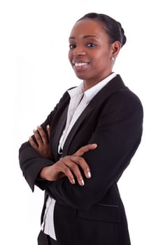 Smiling african american businesswoman with folded arms, isolated on white background
