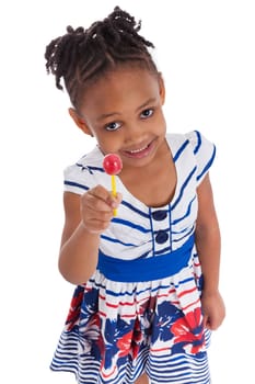 Portrait of a cute little african american girl with a lollipop, isolated on white background