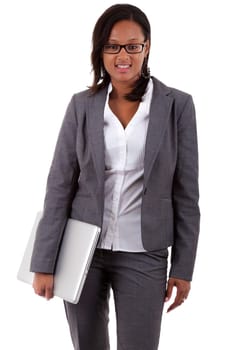 African american business woman holding a laptop, isolated over white background
