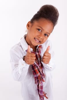 Adorable little African Asian girl  making thumbs up