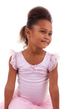 Cute little African Asian girl smiling ,with folded arms