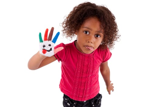 Little African Asian girl with painted hands in colorful paints