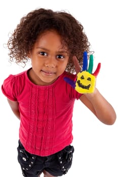 Little African Asian girl with painted hands in colorful paints
