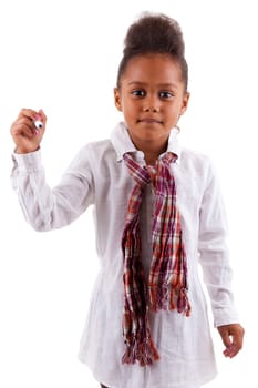 Adorable little African Asian girl holding a pen, isolated on white background