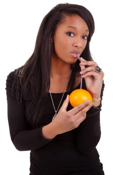 young black woman drinking orange juice, isolated on white background