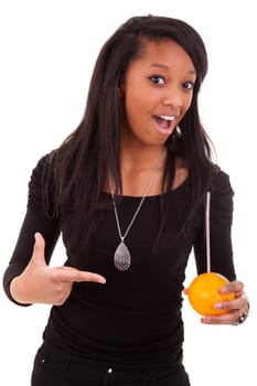 young black woman drinking orange juice, isolated on white background