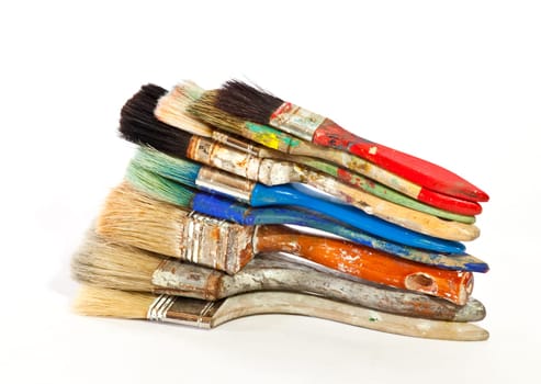 Paintbrushes on white background