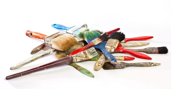 Paintbrushes on white background