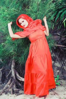 Beautiful asian woman like huntress or spider