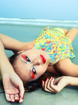 Beautiful asian model posing on the beach