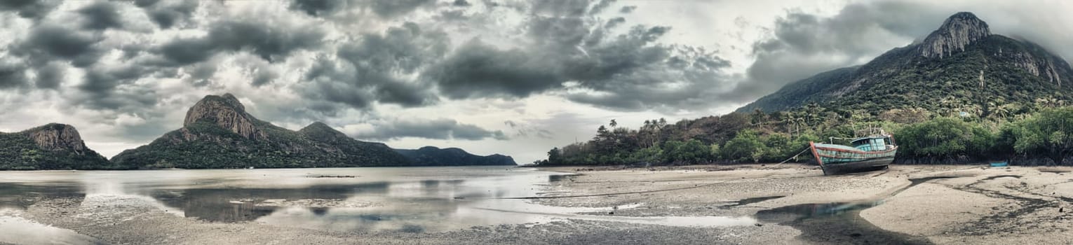 Seascape panorama. Islands, boat and mangroves on background