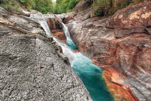 Beautiful waterfall at summer sunny day. Vietnam