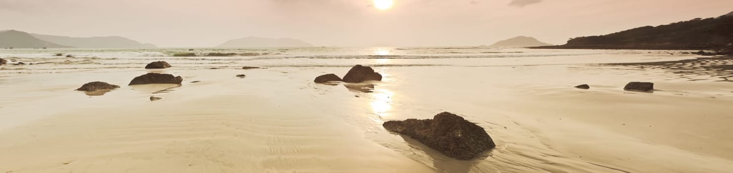 Sunrise over the sea in sepia. Panorama.