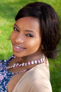 Closeup outdoor portrait of a beautiful black woman