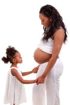 Pregnant black woman with her daughter