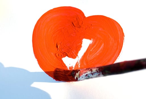 Painting a heart on white background