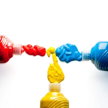 Paintbrushes with Blue, yellow and red Colors on white background