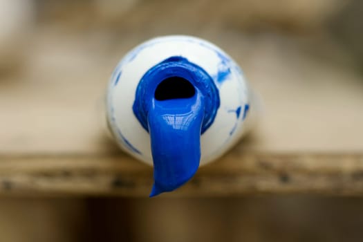 Drop of blue color inside a tube