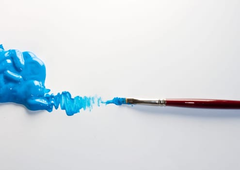 Paintbrushes with Blue Colors on white