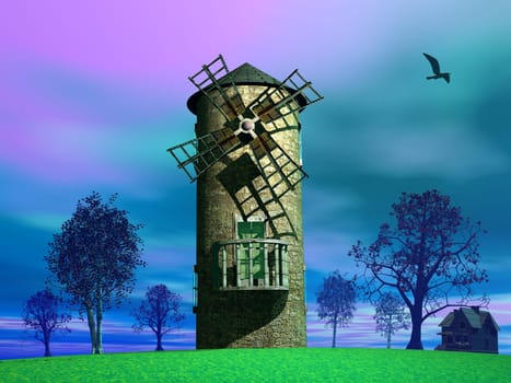 Old windmill in the countryside among trees and next to a small house by morning light