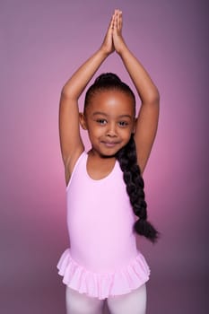 Portrait of a cute little African American girl dancing